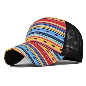Detail view of colorful bohemian striped pattern and breathable black mesh on a trucker cap