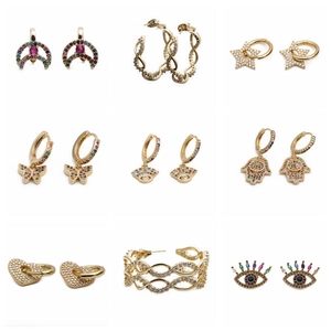 Gold-plated stud earrings collection featuring zircon evil eye, moon, and star designs