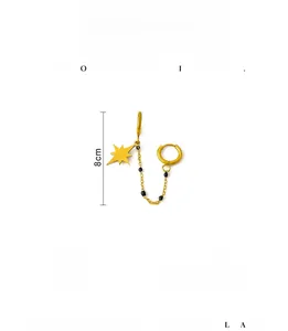 Detail of 18K gold plated stainless steel star drop earring with black beads and 8cm chain