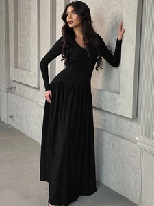 Elegant slim-fit black long sleeve V-neck maxi dress with high waist and pleated skirt