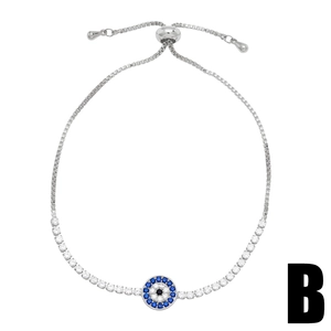 Adjustable silver evil eye bracelet with sparkling blue and white cubic zirconia crystals