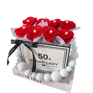 Elegant 9-piece red soap rose gift box with pearl necklace and black ribbon detail