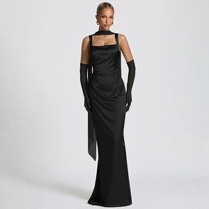Detail of elegant black satin long evening gown featuring chic neck strap and slim waist