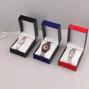 Three premium PU leather watch display boxes in black, blue, and red with soft pillows