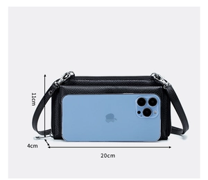 Detailed view of black litchi pattern phone bag with size labels 20cm x 11cm x 4cm