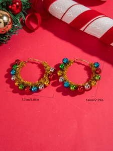 Detailed view of Christmas hoop earrings with colorful bells and dimensions on red background