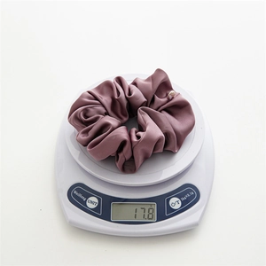 Detailed weight measurement showing 17.8g for the premium purple satin hair scrunchie