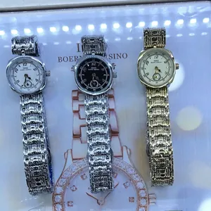 Luxury IBSO women's quartz watch set with metal link straps in gold and silver finishes
