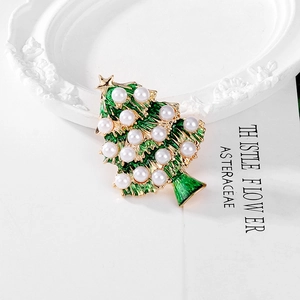 Vintage green enamel Christmas tree brooch with white pearls and gold star topper