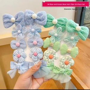 Detailed set of 20 turquoise blue hair clips with flower and ribbon motifs for girls