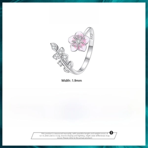 Detail view of S925 sterling silver cherry blossom ring with pink enamel petals