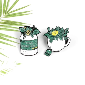 Cartoon plant enamel pin set featuring cactus and lemon tree in creative medicine bottle