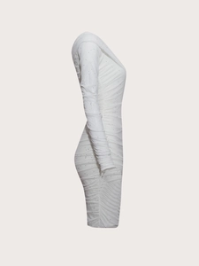 Side view detail of white bodycon dress with glitter mesh and ruched texture