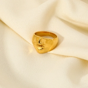 Artistic 18K gold plated stainless steel ring with 3D face relief and punk aesthetic