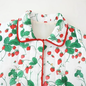 Quilted floral cotton jacket for women featuring strawberry prints and red piping detail