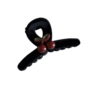 Elegant black velvet cherry hair claw clip for women's hairstyle with sleek finish