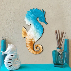 Wooden seahorse wall art featuring ocean scenery for Mediterranean nautical home decor