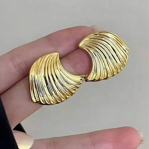 Minimalist gold shell texture fan earrings with elegant wavy metallic ridges
