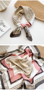 Detailed view of 70cm silk square scarf featuring geometric grid patterns and color blocking