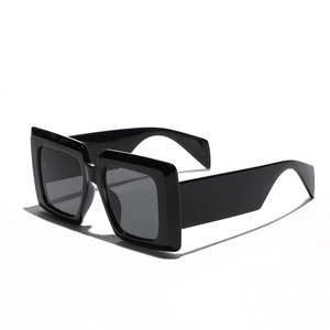 Classic black oversized square sunglasses in a 45-degree side view for a retro fashion look