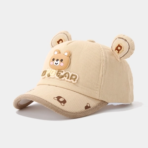 Detail of khaki corduroy child baseball cap with 3D bear ears and textured embroidery