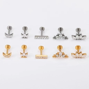 G23 titanium labret studs with moon and crown zirconia designs in gold and silver