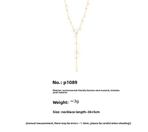 Detail of 18k gold plated titanium steel Y-necklace with pearls and bead accents