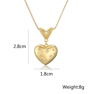 Detail of 18K gold plated heart pendant showing dimensions 2.8x1.8cm and star texture