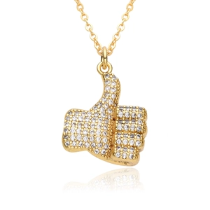 Hip hop style gold thumbs up pendant necklace with white zircon pavé setting on white background