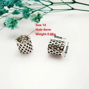 Macro shot of 8mm hollow mesh barrel bead with 6mm hole for DIY jewelry making