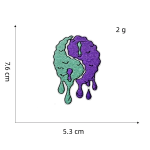 Melting Yin Yang embroidered patch in mint green and purple, 7.6cm by 5.3cm DIY patch
