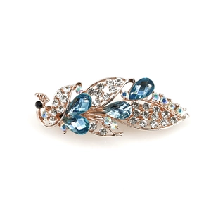 Barrette paon dorée élégante avec pierres bleues et strass en cristal scintillants