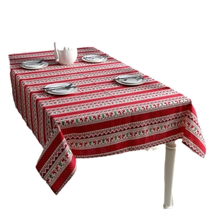 Christmas tablecloth with red reindeer and snowflake patterns on a cotton linen blend fabric