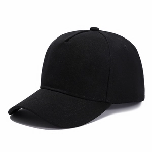 Side view of a black five-panel cotton twill baseball cap on white background