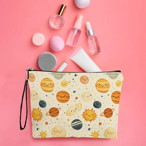Cute sun and planet pattern makeup bag with zipper and handle on a pink background