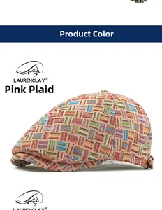 Close-up of pink plaid flat cap featuring colorful textured weave and vintage pattern