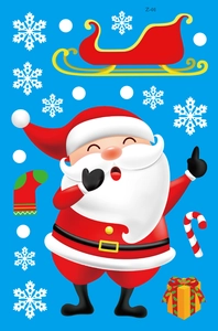 Flat lay of Christmas window stickers featuring Santa Claus, white snowflakes and red sled