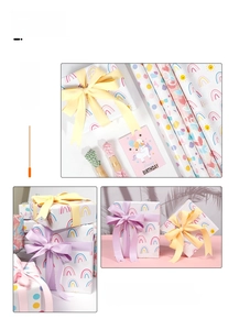 Detail of macaron color gift wrapping paper with rainbow and polka dot patterns