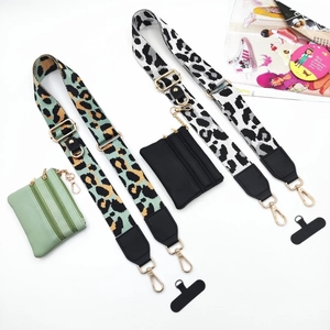 Adjustable leopard print strap set with matching mini pouches and phone tether tabs
