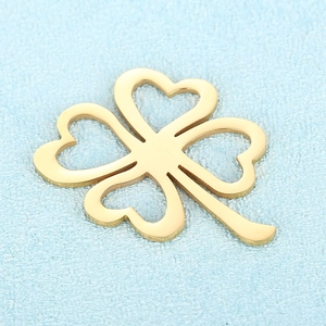 Golden hollow four-leaf clover pendant accessory made of polished stainless steel for jewelry