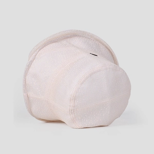 Detail view of the lightweight beige lace texture and fine knit of the sun bucket hat