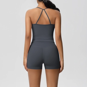 Rear view of cross-strap back yoga tank top and high-waist sports shorts set in grey