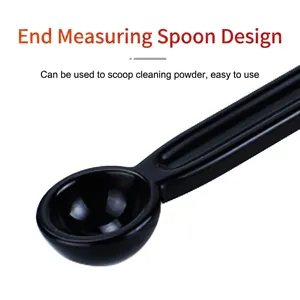 Espresso machine cleaning brush featuring a scoop design for measuring detergent powder
