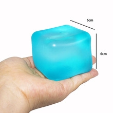 Blue LED glowing stress relief toy cube held in hand showing 6cm x 6cm dimensions