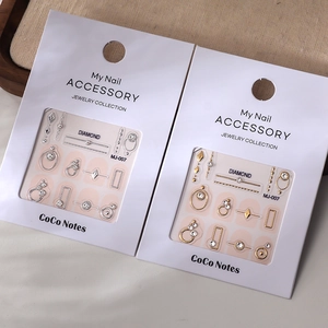Luxury gold and silver K9 nail art stickers with geometric metal shapes and rhinestones