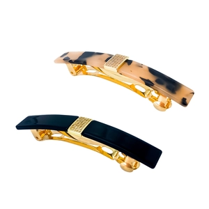 Elegant acetate hair clip set with tortoise shell pattern and gold metal buckle detail