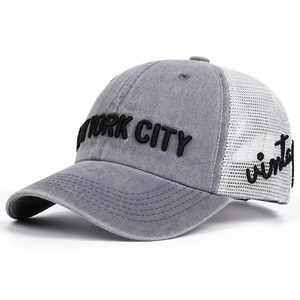 Detailed embroidery of New York City text on vintage washed cotton trucker hat