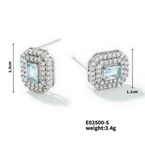 Detailed view of silver square stud earrings with light blue gemstone and dimensions