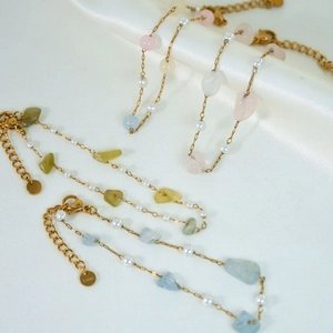 Colorful natural stone bracelet with pearls and gold stainless steel chain on silk