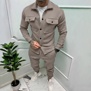 Detail of khaki suede casual two-piece set featuring dual chest pockets and drawstring pants